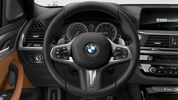 BMW X3 M40i et BMW X3 M40d, Variable Sport Steering. Intérieur des BMW X3 M40i et BMW X3 M40d, habitacle avec volant M en cuir et sièges M sport.