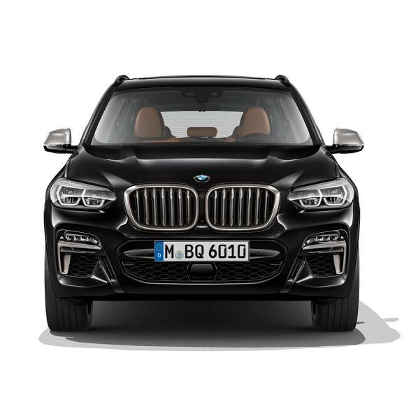 BMW X3 M40i, vue de profil. Extérieur de la BMW X3 M40i en Saphierschwarz metallic, vue de face.