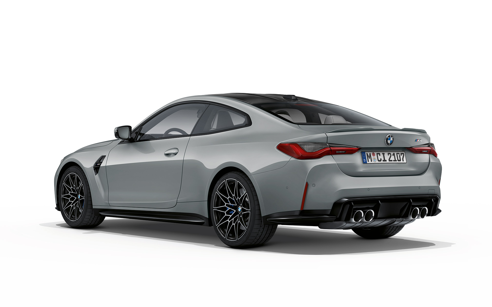 BMW M4 Coupé G82 2020 Brooklyn Grau metallic vue de trois quarts arrière